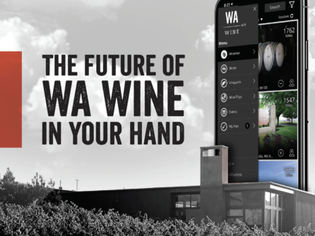 Black and white image of a modern building with grape vines in the foreground. A mobile phone is pictured on the left side of the image, showing the WA Wine app. Text overlay reads: "The future of WA Wine in your hand."